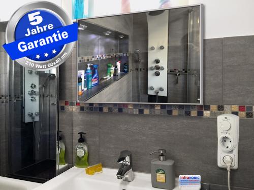 Preview: Infrarotheizung Glas schwarz 210 Watt 60x40 cm - Rahmen M10 - mit Thermostat