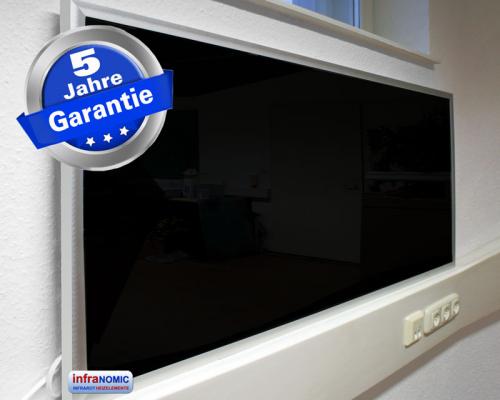 Preview: Infrarotheizung 700 Watt schwarz mit Rahmen M23 Raumansicht